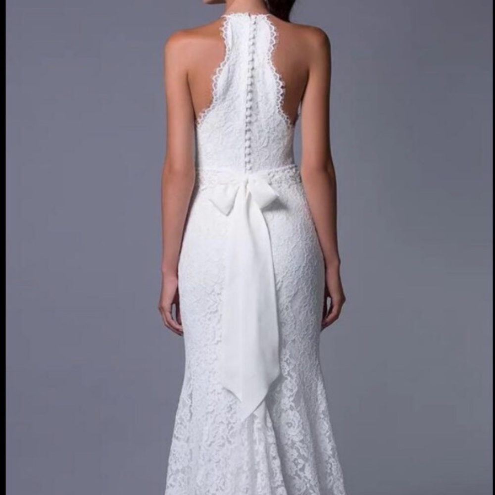 Beautiful wedding dress White lace, button up back